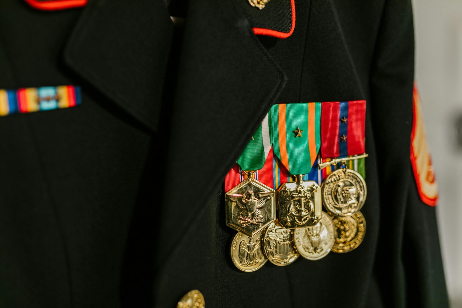 Close-up of a military uniform with vibrant medals representing honor and recognition.